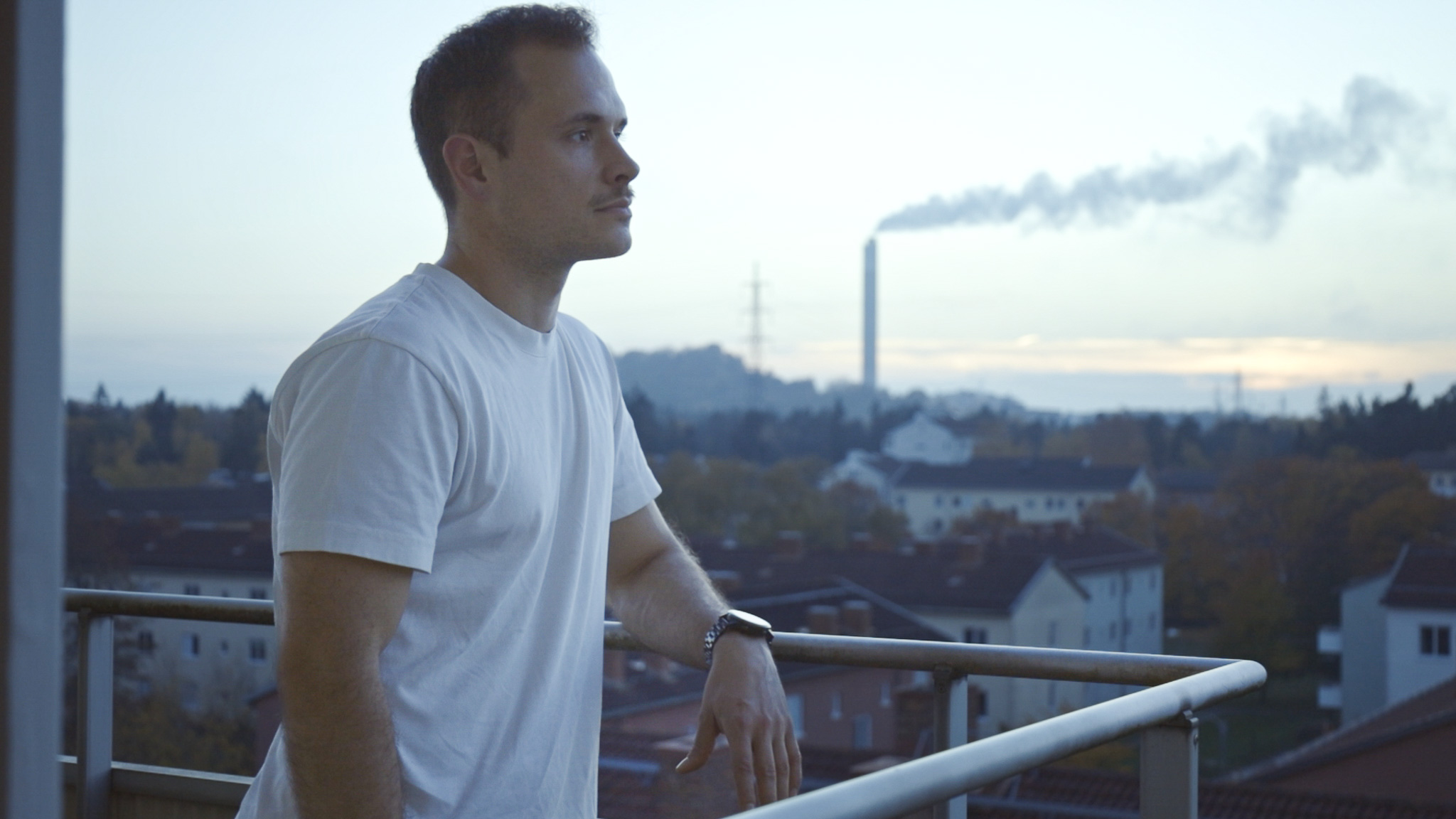 The author standing on a balcony looking over the horizon.