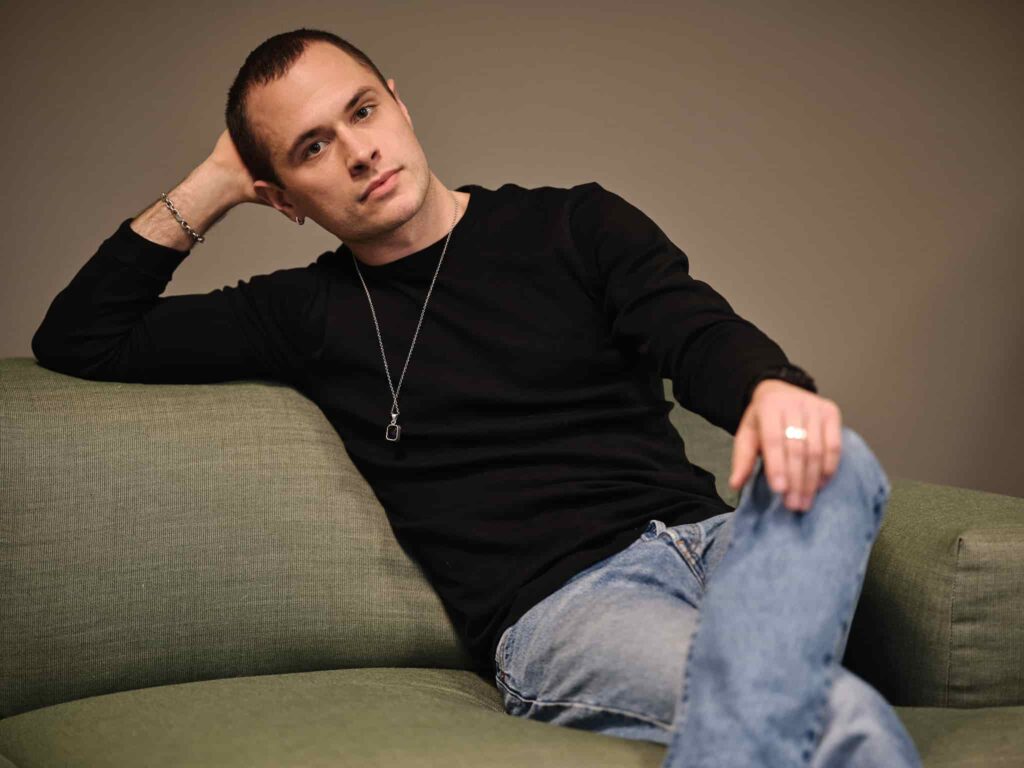 Simon Rajala sitting in a couch